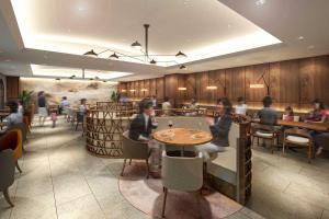 a restaurant with people sitting at a table at TAOYA Hakone in Hakone