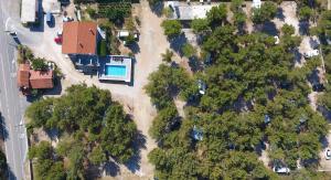 an aerial view of a house with a pool at Camp Krka in Lozovac