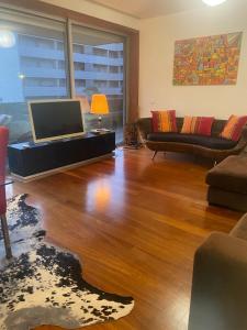 Χώρος καθιστικού στο Cozy Apartament