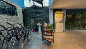 a group of bikes parked next to a building at Olas del alba in Tapantí