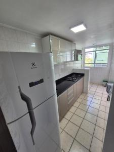 Kuchyň nebo kuchyňský kout v ubytování Apartamento Itaimbe - Centro - Garagem