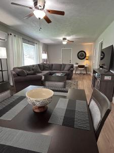 a living room with a couch and a table at Tandem Lodge - Unit 2 in Hendersonville