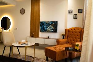 Et tv og/eller underholdning på Elysium Tower Boutique Premium Apartments Centaurus View Islamabad