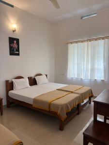 Postel nebo postele na pokoji v ubytování Bon Voyage Signature Holidays