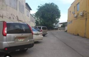 a group of cars parked on the side of a street at Hotel Chitré in Chitré