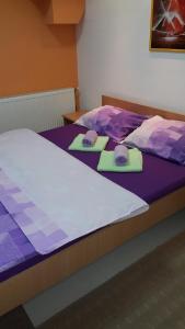 Postel nebo postele na pokoji v ubytování Hostel Paparazzo & Apartmens