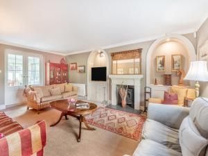 a living room with a couch and a table at The Glebe in Heckington