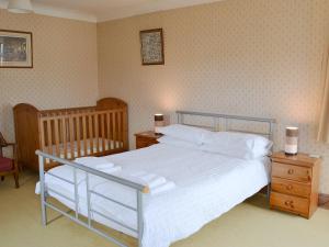 Una cama o camas en una habitación de Windways