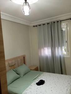 Ένα ή περισσότερα κρεβάτια σε δωμάτιο στο Mariposa sweet Home