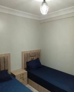 Ένα ή περισσότερα κρεβάτια σε δωμάτιο στο Mariposa sweet Home