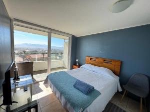 Postel nebo postele na pokoji v ubytování depto para 2 frente al mar + 16 fotografií