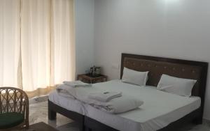 Ένα ή περισσότερα κρεβάτια σε δωμάτιο στο PJ Duplex- A Luxury Stay in Kedarnath +10 φωτογραφίες