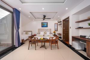 TV/trung tâm giải trí tại CocoPalm Hoi An River Beach