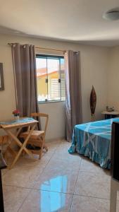 Postel nebo postele na pokoji v ubytování Casa Ragozzino