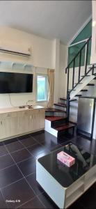 Η κουζίνα ή μικρή κουζίνα στο Pasak River Bungalow