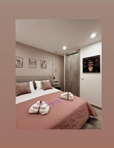 Postel nebo postele na pokoji v ubytování Umbertos Rooms