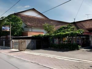 a building on the side of a street at Hotel Wijaya Magelang in Magelang