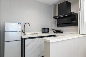 Nhà bếp/bếp nhỏ tại Zhangjiajie Longing Mountain B&B