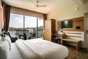 Ένα ή περισσότερα κρεβάτια σε δωμάτιο στο Neelkanth - The Himalayan View Abode