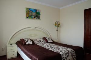 Postel nebo postele na pokoji v ubytování Argo Premium