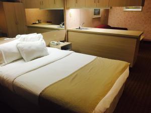 Postel nebo postele na pokoji v ubytování Microtel Inn & Suites by Wyndham Syracuse Baldwinsville