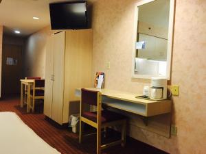 TV a/nebo společenská místnost v ubytování Microtel Inn & Suites by Wyndham Syracuse Baldwinsville