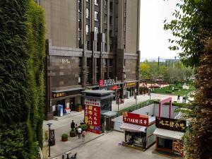 Fotografie z fotogalerie ubytování Echarm Hotel Kunming High-speed Railway South Station Chunrong Street Metro Station v destinaci Kchun-ming