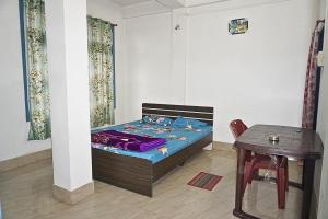 Postel nebo postele na pokoji v ubytování Taj Residency Holiday Homestay, Best Entire Homestay in Jorhat