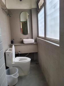 Koupelna v ubytování Meenakshi Home Stay