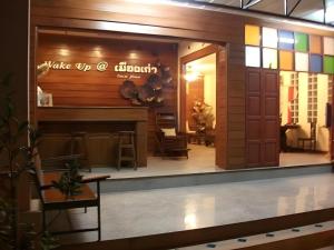 a view of a bar from the lobby of a restaurant at Wake Up at Muang Kao Boutique Hotel in Sukhothai