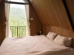 Postel nebo postele na pokoji v ubytování Harumi Home Dalat + 13 fotografií