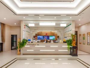 a waiting area of a dermatologist office in a building at GreenTree Inn Nantong University Industrial Expo City Express Hotel in Nantong