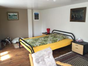 
Ein Bett oder Betten in einem Zimmer der Unterkunft Wohlfühloase für Mensch und Hund
