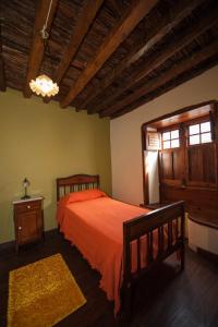 Giường trong phòng chung tại Casa Vidal