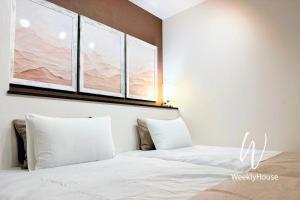 เตียงในห้องที่ WeeklyHouse Silto Crete - Vacation STAY 69850v