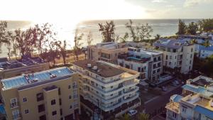 an aerial view of buildings and the ocean at Spacious 3 bed seaview apartment in Flic-en-Flac