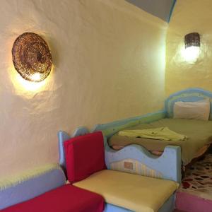 Katil atau katil-katil dalam bilik di Nubian Palace Eco Lodge
