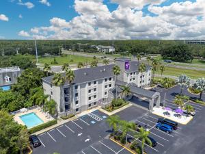 an overhead view of a hotel with a parking lot at Sleep Inn near Busch Gardens - USF in Tampa