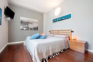 Postel nebo postele na pokoji v ubytování Dreams To Lake Como