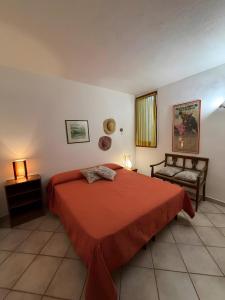 Ένα ή περισσότερα κρεβάτια σε δωμάτιο στο Villa Margherita