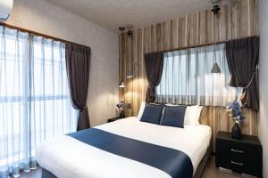 En eller flere senge i et værelse på JAPAVISTA Leggero