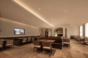 TV a/nebo společenská místnost v ubytování Atour Hotel Shanghai Wujiaochang Xiangyin Road