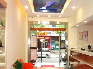 a view of a gas station from the lobby at 7 Days Inn Jinggangshan Scenic Spot in Jinggangshanzonghekenzhichang