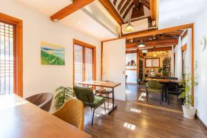 a dining room with a table and chairs at Hanok Got in Seoul