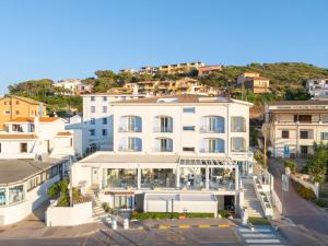 an aerial view of a large white building at Best Western Hotel Blumarea in Castelsardo