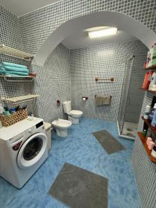 Et badeværelse på Huis met zwembad