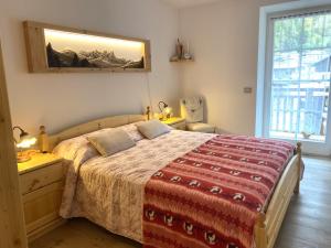 Ένα ή περισσότερα κρεβάτια σε δωμάτιο στο Appartamento LatteMiele