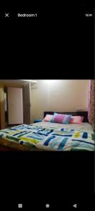 Ένα ή περισσότερα κρεβάτια σε δωμάτιο στο PARK VIEW In MYSORE CITY