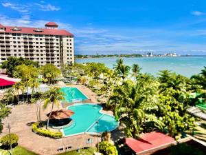 an aerial view of the resort and the ocean at GloryBeachResort2BedroomWifiNetflixFreeparking in Port Dickson