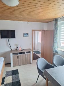 Μια τηλεόραση ή/και κέντρο ψυχαγωγίας στο Hotel Harbauer